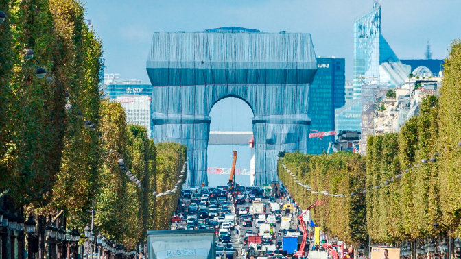 Wrapping of landmark Arc de Triomphe monument in Paris